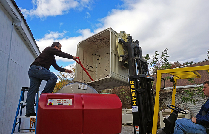 Shoveling Merlot into the grape press